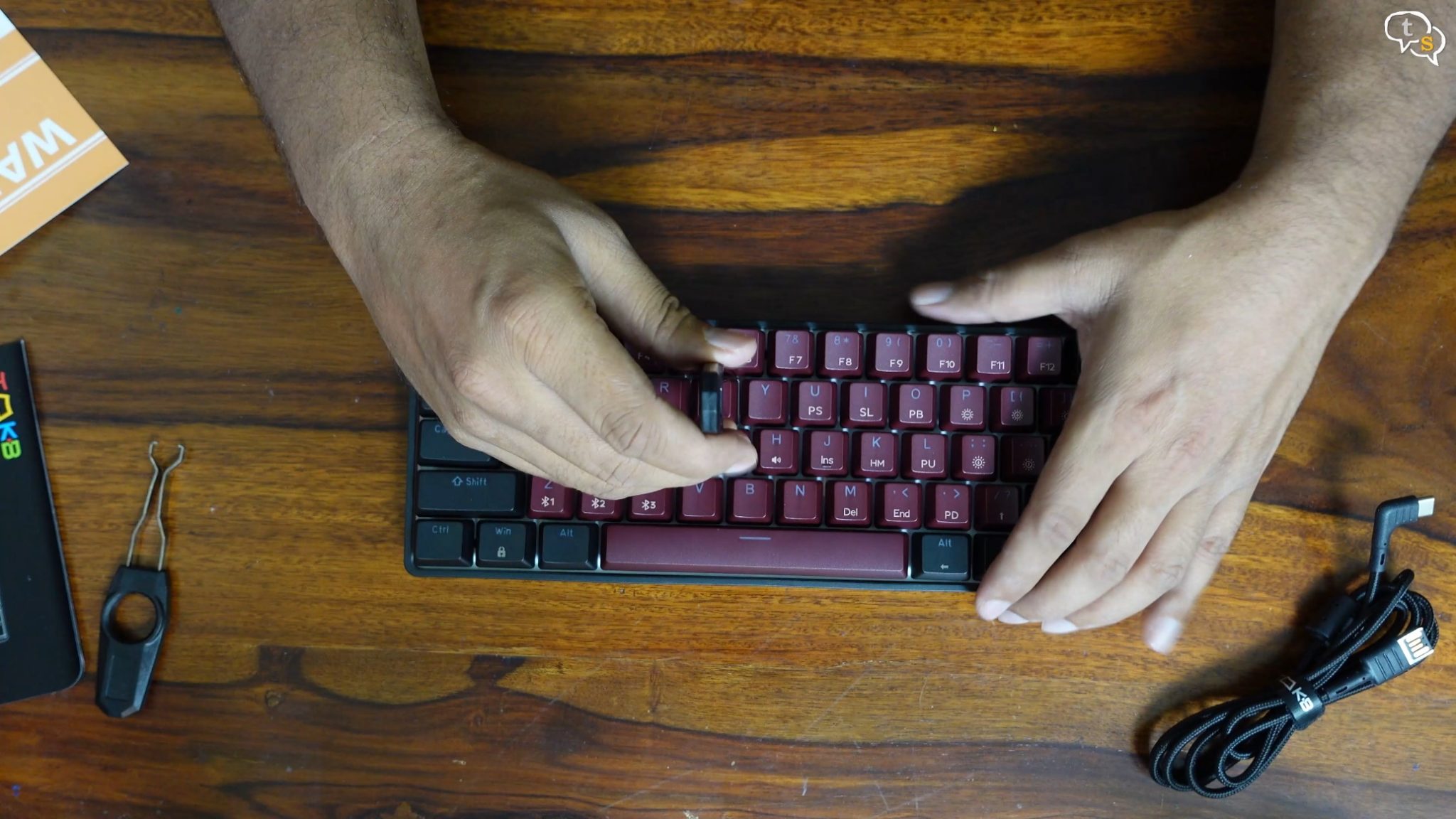 A person typing on a keyboard Description automatically generated with medium confidence