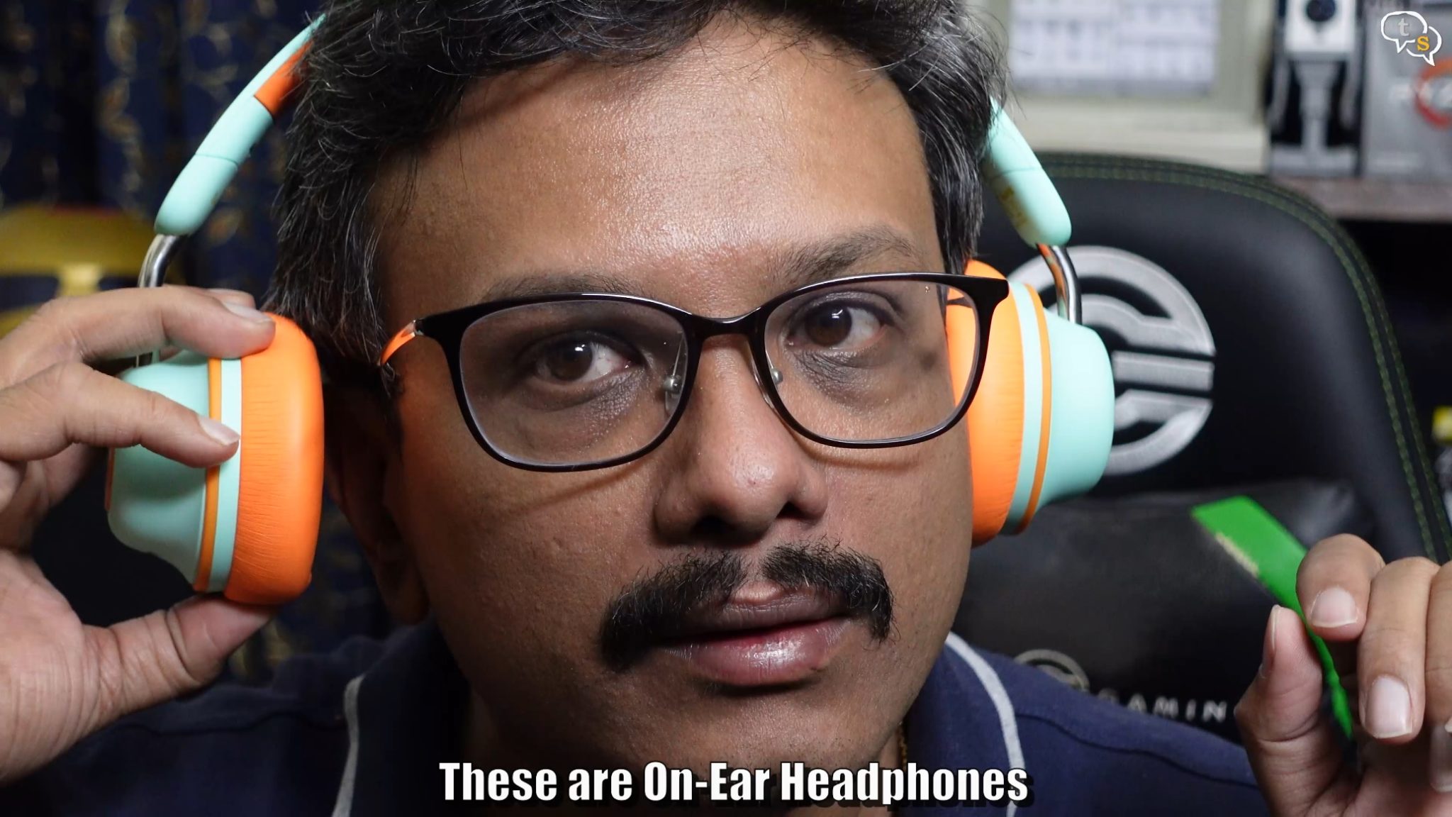 A person wearing headphones Description automatically generated with medium confidence