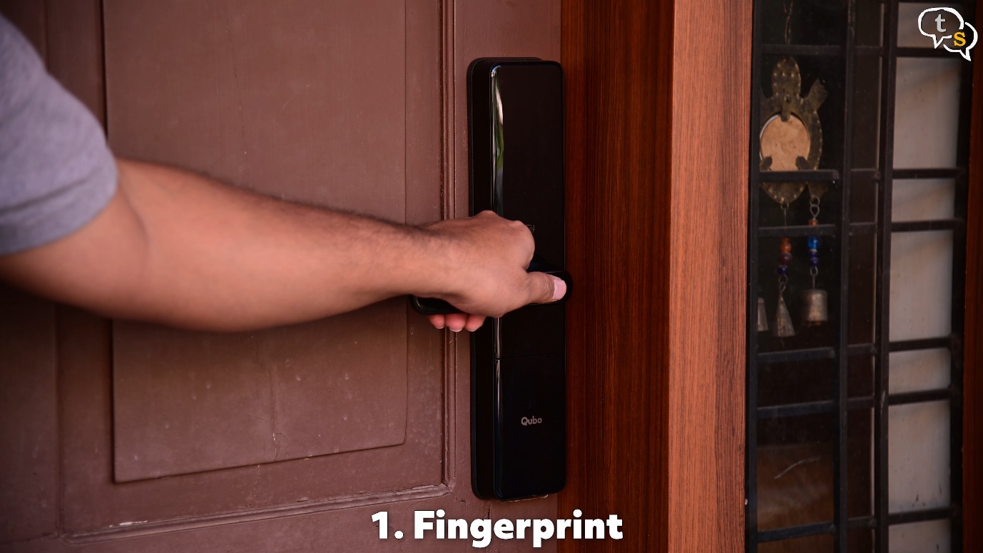 A person opening a door Description automatically generated with low confidence