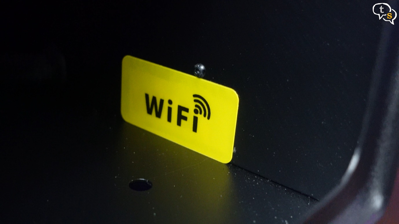 A yellow sign on a black surface Description automatically generated with low confidence