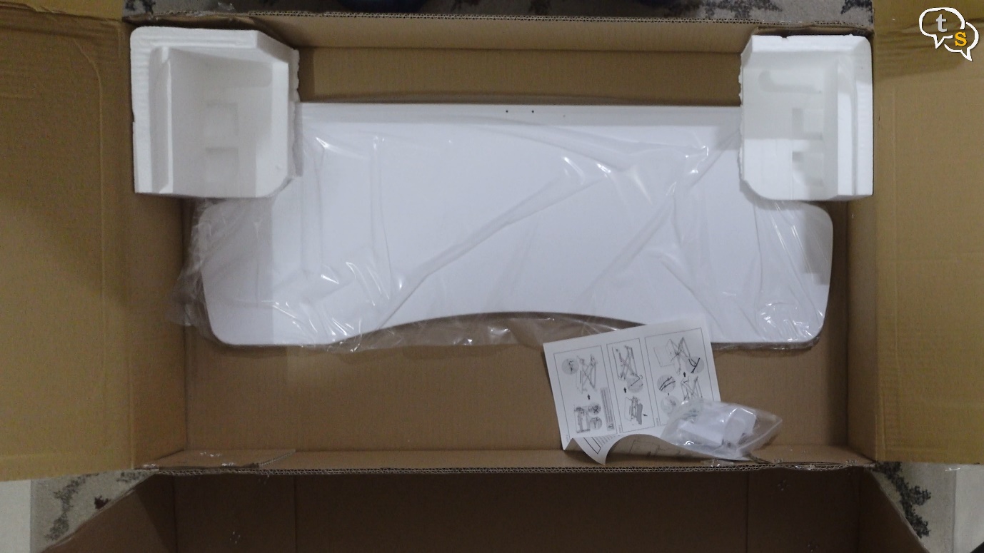 A picture containing text, packing materials, cardboard, carton Description automatically generated